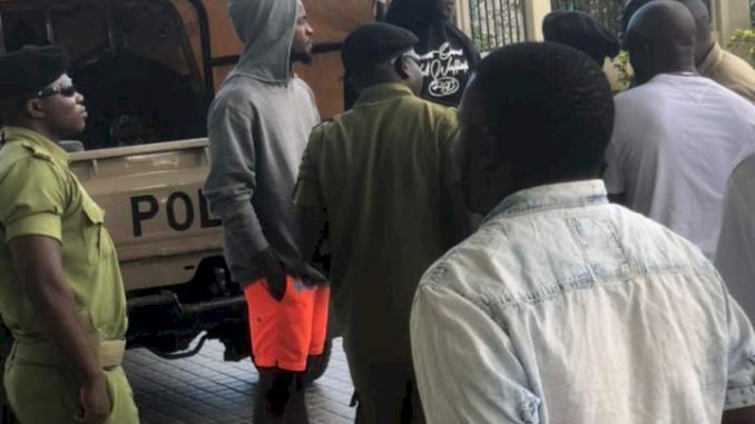 Singer Kizz Daniel Arrested In Tanzania For Not Performing At His Concert......Watch Video Of Him Being Escorted By The Police