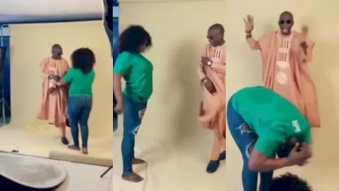 Confusion As Camerawoman Suddenly Goes Into Trance During Photoshoot (Video)