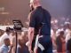 SHOCKING: Pastor Mounts Pulpit To Preach With AK-47 Rifle In Abuja (Video)